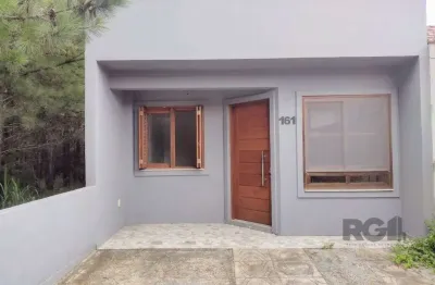 Casa térrea - 2 dormitórios, área coberta com churrasqueira , terraço - 02 vagas