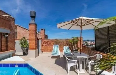 Casa em condomínio fechado com 3 quartos à venda na Avenida Jacuí, 978, Cristal, Porto Alegre