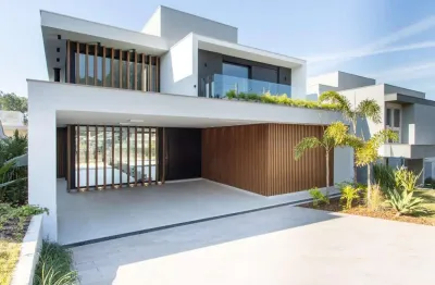 Casa em condomínio 4 dormitórios à venda vila nova porto alegre/rs