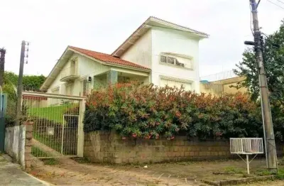 Casa com 3 quartos à venda na Rua Felipe Becker, 159, Três Figueiras, Porto Alegre