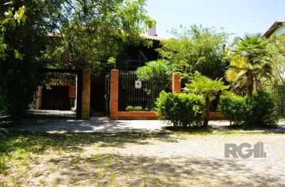 Magnífica mansão anos 90 a beira do guaíba na zona sul de porto alegre!