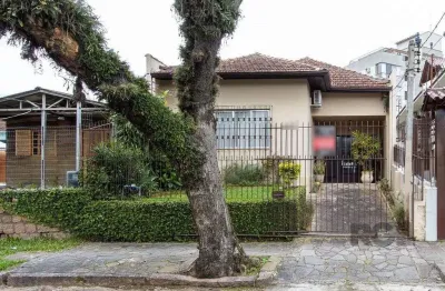 Casa térrea, 2 quartos, 2 vagas, edicula com 1 quarto e um banheiro - bairro tri