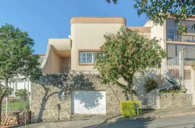 Casa com 4 quartos à venda na Rua Fernando Osório, 440, Teresópolis, Porto Alegre