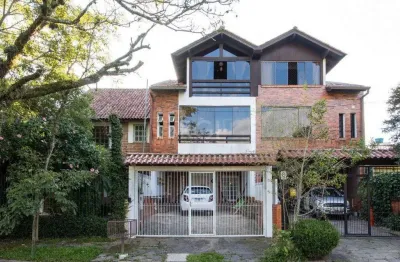 Casa com 3 quartos à venda na Rua Ponciano Pacheco da Silveira, 114, Guarujá, Porto Alegre
