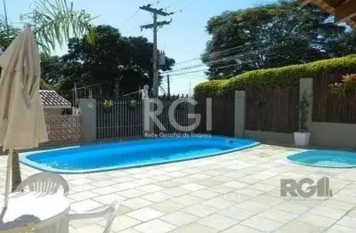 Casa em condomínio fechado com 3 quartos à venda na Rua Humberto de Campos, 601, Partenon, Porto Alegre