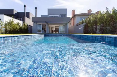 Casa em condomínio 4 dormitórios à venda belém novo porto alegre/rs