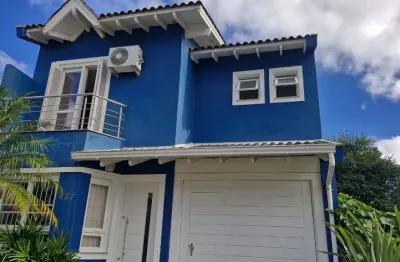 Casa em condomínio fechado com 163 m² de área útil, portaria 24 h e todo confort