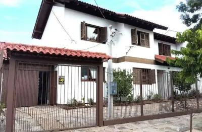 Casa com 3 quartos à venda na Rua Ari Peixoto Martins, 64, Espírito Santo, Porto Alegre