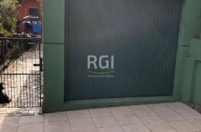 Terreno à venda na Rua Xavier da Cunha, 677, Nonoai, Porto Alegre