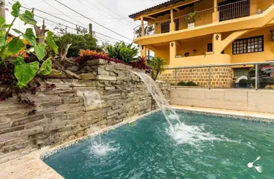 Casa com 4 quartos à venda na rua moacir bastiani, 334, campo novo, porto alegre, 320 m2 por r$ 1.850.000