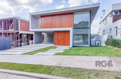 Casa em condomínio 4 dormitórios à venda alphaville porto alegre/rs