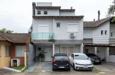 Casa em condomínio 4 dormitórios à venda vila nova porto alegre/rs