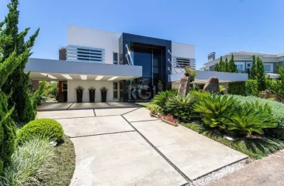 Casa em condomínio 5 dormitórios à venda belém novo porto alegre/rs