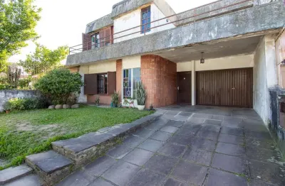 Casa com 4 quartos à venda na Rua Tupã, 88, Vila Assunção, Porto Alegre