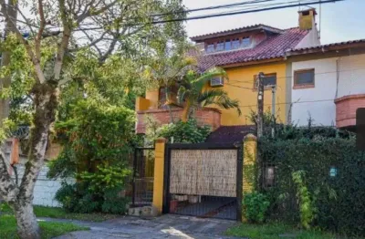 Casa com 3 quartos à venda na Rua Mura, 120, Guarujá, Porto Alegre