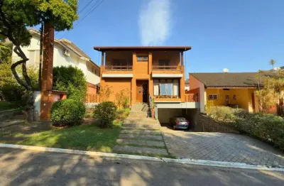 Casa elegante com lazer completo no Alphaville Residencial 11