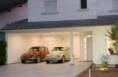 Casa Alto Padrão na Aldeia da Serra com 4 Suítes, Piscina e 450m²