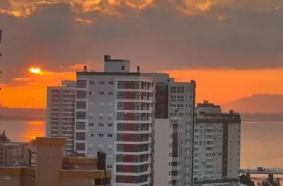 Apartamento para venda em tramandaí, centro, 2 dormitórios, 1 suíte, 2 banheiros, 1 vaga