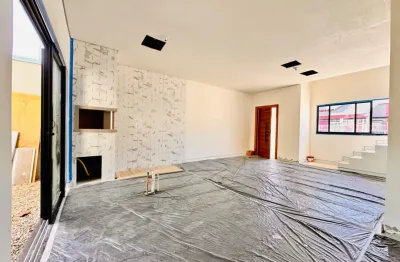 Casa para venda apenas 2 unidades no lote com 3 quartos sendo 1 suíte, 2 vagas de garagem individuais e um lavabo.
