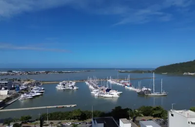 partamento no bairro Fazenda Lauro Muller, com frente mar, são 3 Dormitórios e 2 vagas