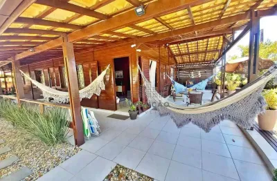 Casa de esquina, 3 dormitórios, sendo 1 suíte, 4 vagas de garagens, próximo ao mar, praia de fora, palhoça/sc