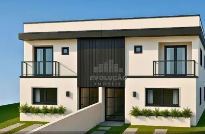 Sobrado à venda com 110 m² de área construída, 2 vagas de garagem, 3 dormitórios, 2 banheiros, sala com ventilação natural e cozinha