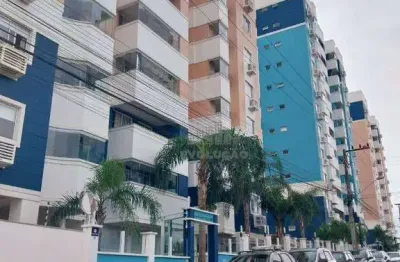 Apartamento de 2 dormitórios, sendo 1 suíte, sala grande para 2 ambientes, sacada com churrasqueira a carvão, cozinha com móveis planejados.