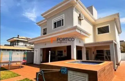 Sobrado com 3 suítes, jardim e jacuzzi - terras do cancioneiro - paulínia