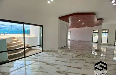 Ampla cobertura com terraço gourmet e vista total ao mar!