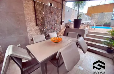 Ampla cobertura triplex, 04 dormitórios com piscina e vista ao mar!