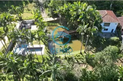 Chácara em meio a natureza com lagoa, piscina e terreno de 2.127m² à venda em tijucas/sc