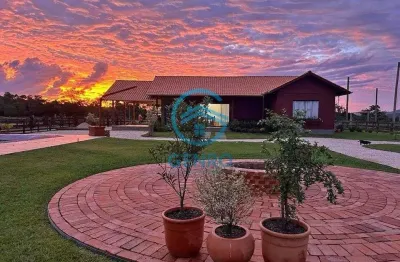 Chácara com piscina em condomínio rural e terreno de 1.920m² à venda em canelinha/sc
