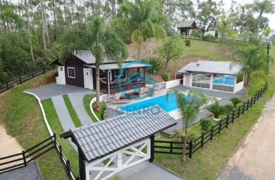 Chácara em meio a natureza com piscina e terreno de 5.000m² à venda em nova trento/sc