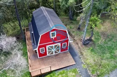 Cabana estilo celeiro americano com vista para as montanhas com terreno de 30.400m² à venda em urubici/sc