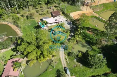 Chácara em meio a natureza com piscina, 02 lagoas e com terreno de 9.100m² à venda em tijucas/sc