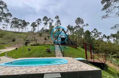 Chále em meio a natureza com piscina, lagoa e uma bela vista do por do sol à venda em nova trento/sc