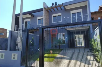 Sobrado com 3 dormitórios à venda, 112 m² por r$ 630.000,00 - girassol - gravataí/rs