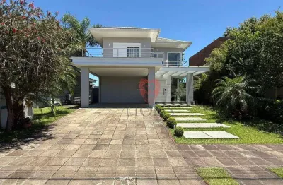 Casa com 3 dormitórios para alugar, 260 m² por r$ 16.240,00/mês - alphaville - gravataí/rs