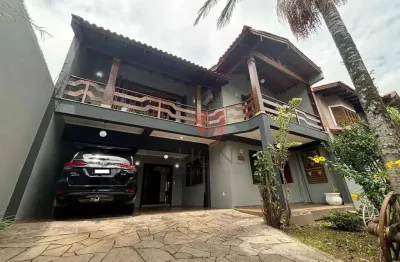 Sobrado com 4 dormitórios à venda, 320 m² por r$ 1.170.000 - girassol - gravataí/rs