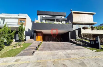 Casa com 3 dormitórios à venda, 222 m² por r$ 2.390.000,00 - alphaville - gravataí/rs