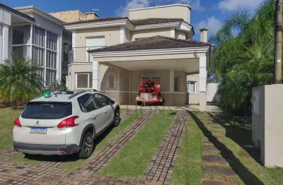 Casa com 3 dormitórios, 220 m² - venda por r$ 2.200.000,00 ou aluguel por r$ 10.178,52 - alphaville - gravataí/rs