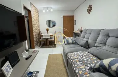 Apartamento semimobiliado 2 dormitórios sendo 1 suíte Guilhermina - Praia Grande
