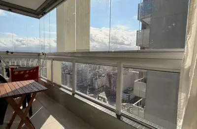 1 dormitórios no boqueirão, prédio com lazer completo á 200m da praia