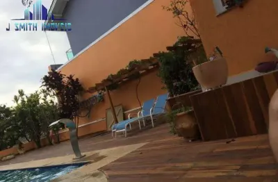 Casa estilosa construída em 2 lotes, em condomínio na granja viana.