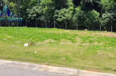 Terreno em condomínio fechado, 129m²  pronto para construir.