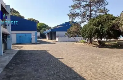 TERRENO COM GALPÕES Á VENDA -  A.T. 7.430m² . AC. 2.816m² (5 galpões+adm)