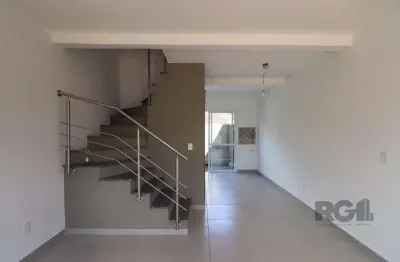 Casa em condomínio fechado com 2 quartos à venda na Rua Miguel Ascoleze, 125, Vila Nova, Porto Alegre