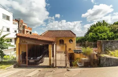 Casa com 4 quartos à venda na Rua Padre João Batista Reus, 2778, Camaquã, Porto Alegre