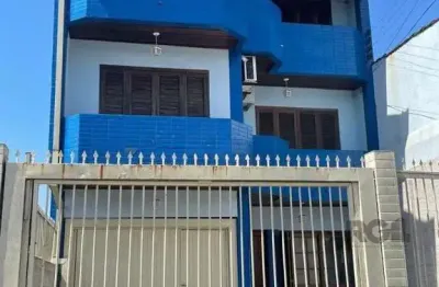 Casa 420m², 4 dormitórios, 3 vagas no bairro partenon