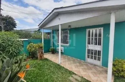 Casa com 4 quartos à venda na Rua Capitão Pedroso, 165, Restinga, Porto Alegre